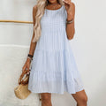 Loose, casual and flowing sleeveless plaid dress