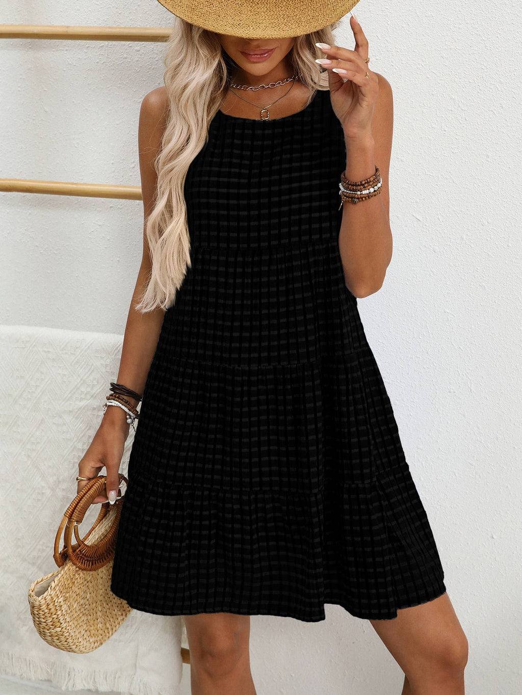 Loose, casual and flowing sleeveless plaid dress