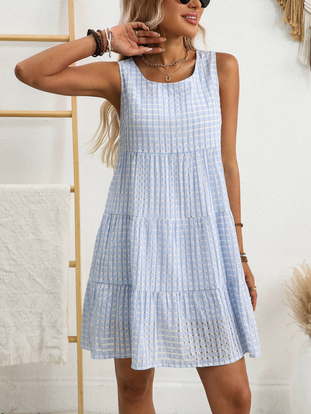 Loose, casual and flowing sleeveless plaid dress